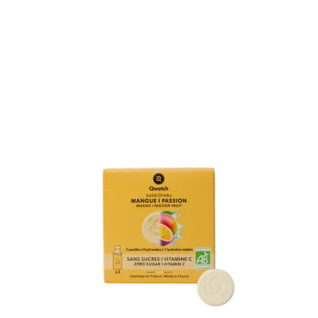 Embalagem amarela de 3 pastilhas Solid Drink Bio sabor manga e maracujá da Qwetch com uma pastilha branca à frente.