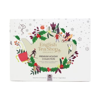 Caixa branca Premium Holiday Collection da English Tea Shop, com ilustração de bule decorado com elementos natalícios e indicação de 48 saquetas de chá biológico em 6 misturas diferentes.